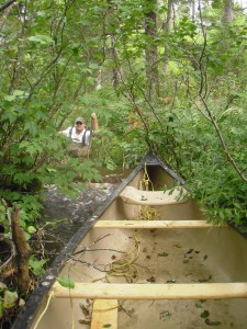 Matt Ward and canoe at beaver dam